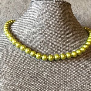 3 necklace by New York and company.  Green faux pearl, circle chain & pendant